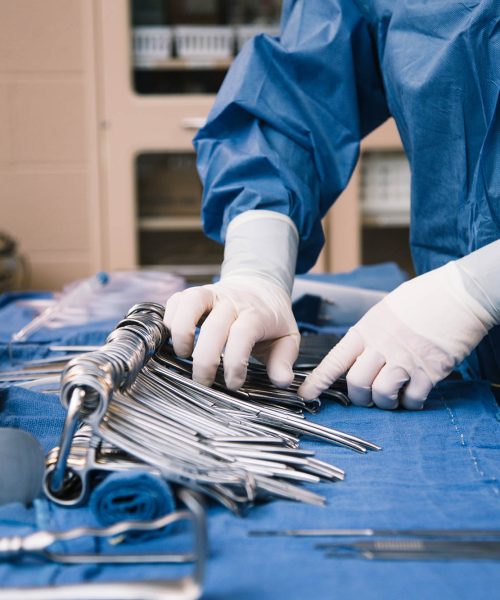 Surg-Tech-student-counting-instruments-at-Central-Tech